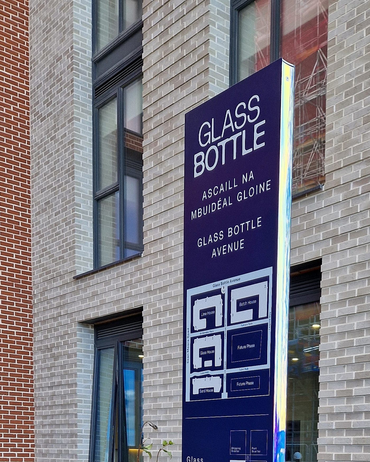 Glass Bottle Quarter, Dublin: campus totem carrying a site plan with individually named blocks, street names and two plots marked Future Phase